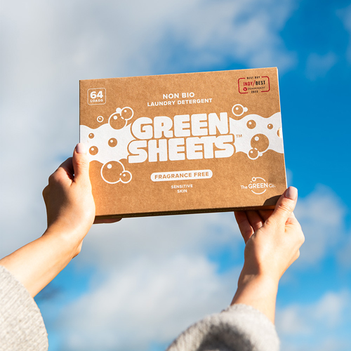 Fragrance Free UK made Eco friendly and kind to the environment washing strips 64 pack in hands blue sky