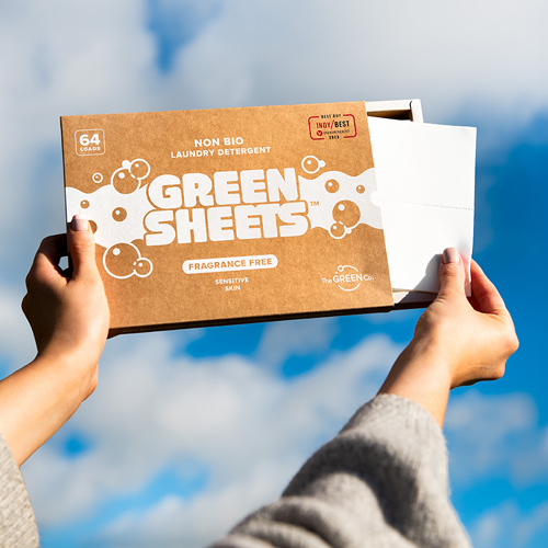 Fragrance Free UK made Eco friendly and kind to the environment washing strips 64 pack in hands blue sky