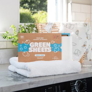 UK made Fresh Linen, Eco plastic free Green Sheets, kind to the environment washing strips 64 pack white towel on kitchen worksurface